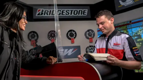 Sales person talking to a customer